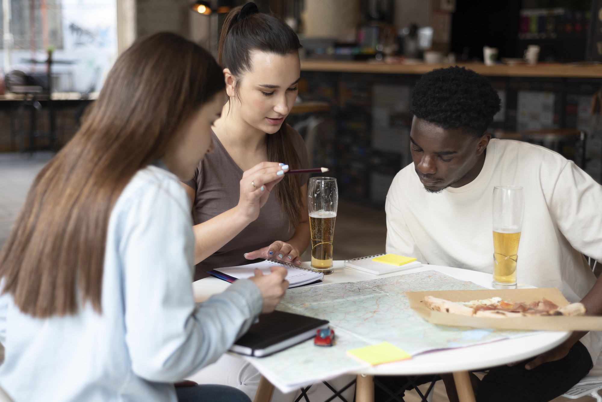 Team discussing menu over samples